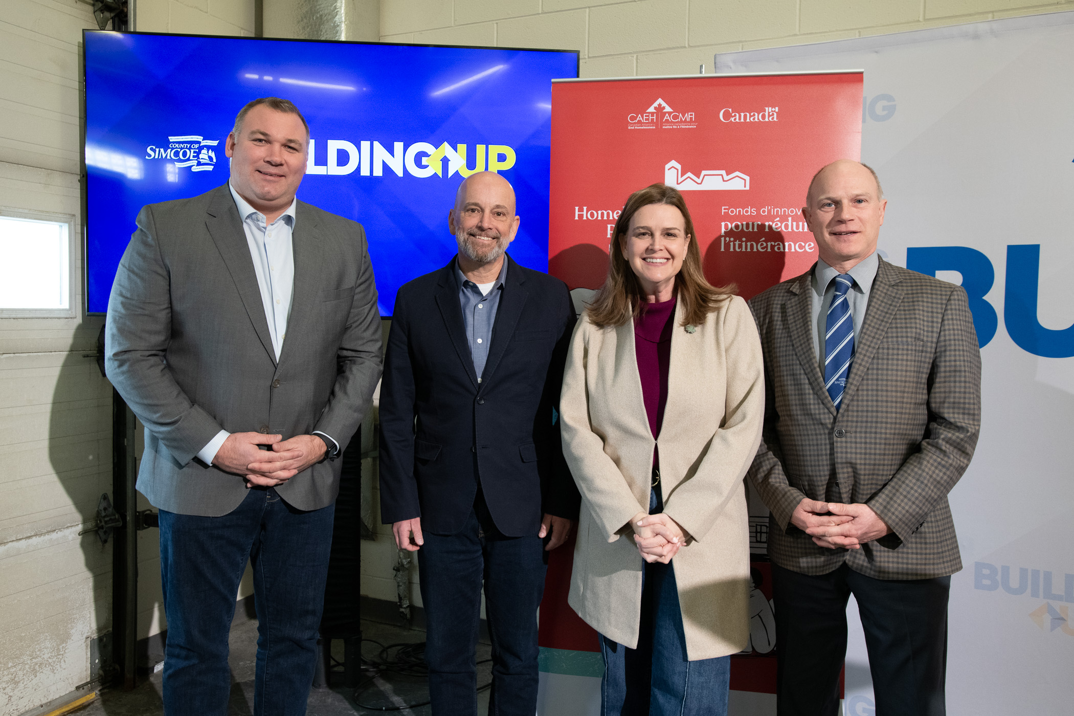 Barrie Mayor Alex Nuttall, CAEH CEO Tim Richter, MP Jennifer McKelvie, and Warden Basil Clarke announce Bridge to Stability program