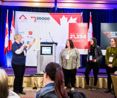 Marie Morrison gives a speech about the 20,000 Homes Campaign.